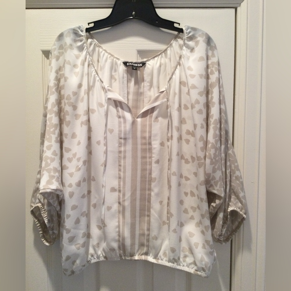 EXPRESS. Size Medium. Ivory/beige, heart printed, tie/untied, blouse.